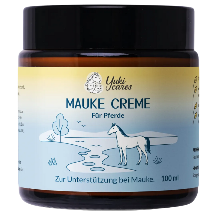 Ein braunes Glasgefäß mit "Mauke Creme für Pferde" von Yuki Cares zeigt eine Illustration eines Pferdes in einer Landschaft.