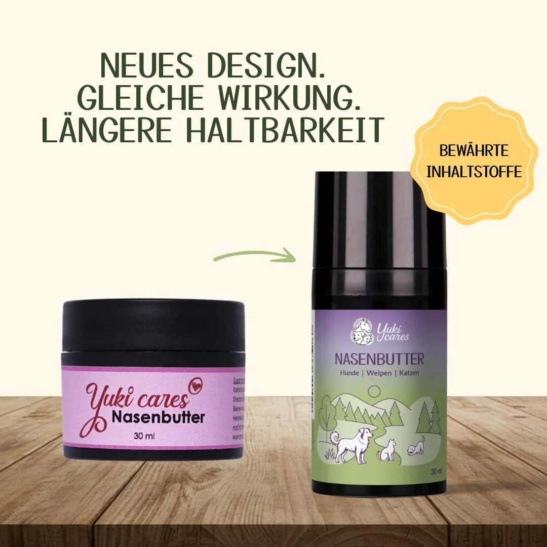 Zwei Verpackungen von Yuki cares Nasenbutter mit neuem Design und bewährten Inhaltsstoffen stehen auf einem Holztisch.