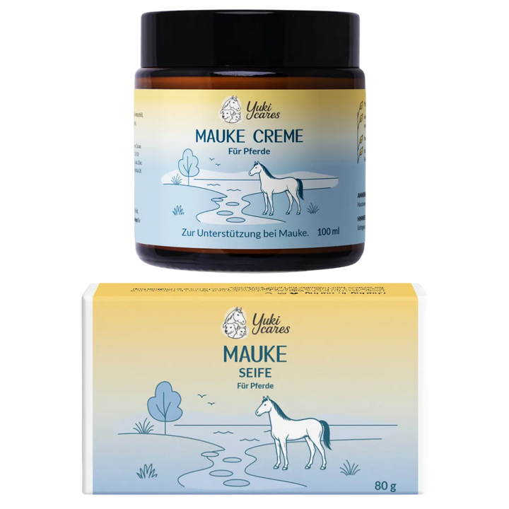 Ein Glas Mauke Creme und eine Packung Mauke Seife für Pferde mit einem Pferdemotiv auf der Verpackung.