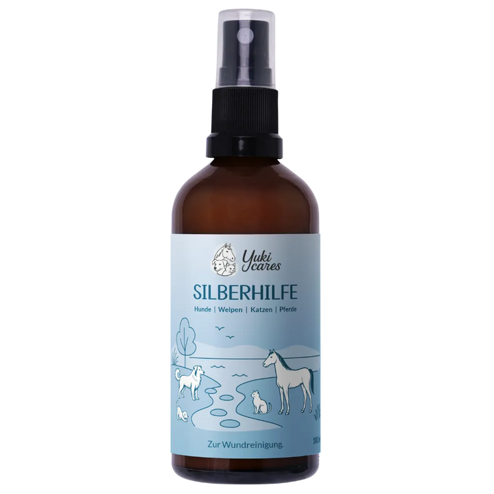 Eine braune Flasche mit dem Etikett "Silberhilfe" zeigt Illustrationen von Tieren und ist zur Wundreinigung gedacht.