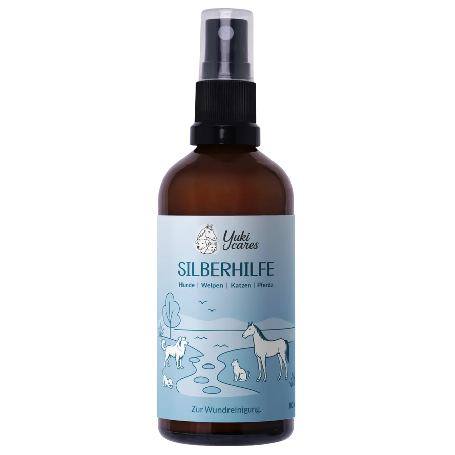 Eine braune Flasche mit dem Etikett "Silberhilfe" zeigt Illustrationen von Tieren und ist zur Wundreinigung gedacht.